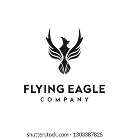 Flying eagle logo design template. Awesome a flying eagle with gold color logo. A flying eagle with gold color logotype.