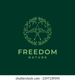 flying freedom swallow with leaves logo design