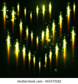 flying glowing sparks on a dark background