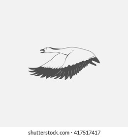 flying goose in grayscale