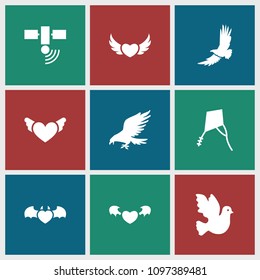 Flying icon. collection of 9 flying filled icons such as eagle, bird, devil heart with wings, kite, heart with wings. editable flying icons for web and mobile.