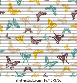 Flying multicolor butterfly silhouettes over striped background vector seamless pattern. Childish fashion fabric print design. Stripes and butterfly garden insect silhouettes seamless illustration.
