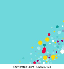 Flying multicolored confetti on a blue background. Red, pink, blue, yellow circles.