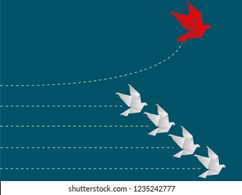 Flying origami. Red paper bird changing direction from white. New ideas. Different business concepts. Courage to risk. leadership. Go to the goal of financial business success and effort go to target.