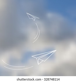 Flying a paper planes. Vector linear drawing, Thick clouds and blue sky. Blurred background. Abstract blurred background. Retro label. Sky blurred background.