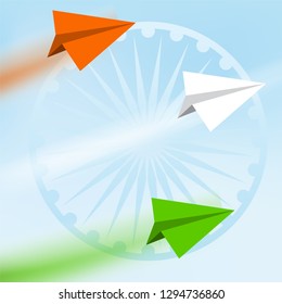 Flying plane in national tricolor with Ashoka Wheel on blue background for Indian Republic Day celebration. 
