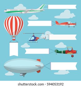 Flying planes pulling advertising banners. Helicopter, airplanes and airship with vertical and horizontal banners. Light air transport with empty ribbons in the sky. 