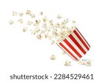 Flying popcorn flakes and bucket, cinema and movie theater snack food container. Vector realistic paper box, bag or cup with pattern of white and red stripes. 3d large bucket full of tasty popcorn
