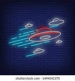 Flying saucers neon sign. Invasion, fantasy, extraterrestrial intelligence design. Night bright neon sign, colorful billboard, light banner. Vector illustration in neon style.