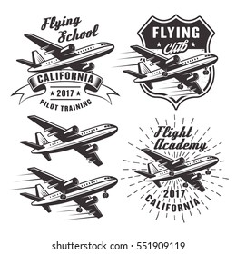 Flying school set of vector emblems, labels and design elements with passenger airplane in monochrome style isolated on white background