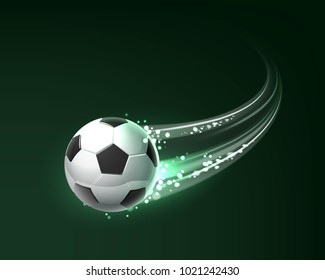 Flying soccer ball with shine motion blur isolated on dark background
