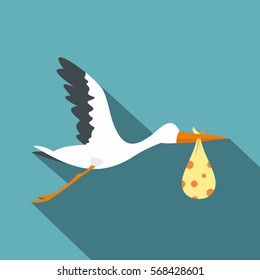 Flying stork with a bundle icon. Flat illustration of flying stork with a bundle vector icon for web on baby blue background