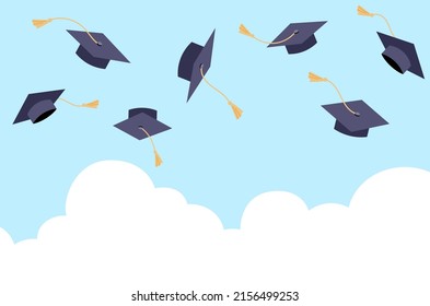 Flying students graduation hats in the blue sky.