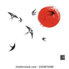 Flying swallow birds and big red sun on white  background. Traditional Japanese ink wash painting sumi-e. Hieroglyph - joy