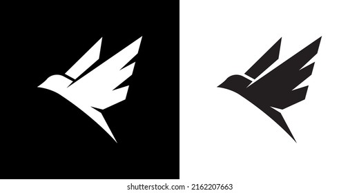 Flying swallow logo. A bird flutters its wings in the sky