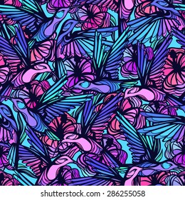 Flying tropical hummingbirds with flowers seamless pattern.