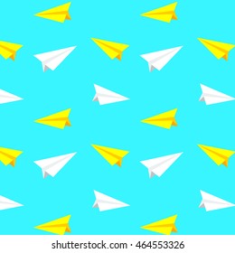 Flying white and yellow paper planes. Vector pattern, background