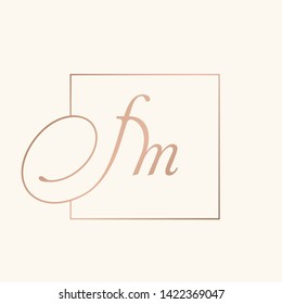 FM monogram.Typographic logo with calligraphic letter f and letter m.Lowercase lettering icon.Framed alphabet initials isolated on light fund.Rose gold metallic color.Elegant, beauty,luxury style.