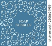 Foam bubbles on a blue background. Round text frame with soap bubbles