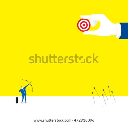 Focus! / A business man is shooting the last arrow.