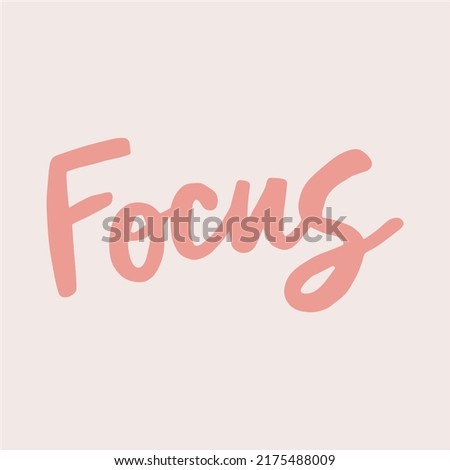 Focus - handwritten with a paintbrush word. 