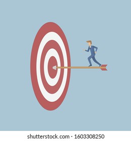 focus marketing target strategy,businessman run to goal on arrow.