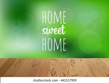 Focus on brown wooden floor with phrase home sweet. Happy summer nature illustration. Spring bright natural background and forest in the back not in focus