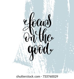 focus on the good hand lettering inscription, motivation and inspiration love and life positive quote, calligraphy vector illustration on blue brush stroke pattern