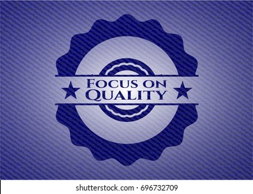 Focus on Quality emblem with jean texture