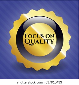 Focus on Quality gold emblem or badge