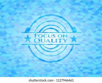 Focus on Quality realistic light blue emblem. Mosaic background