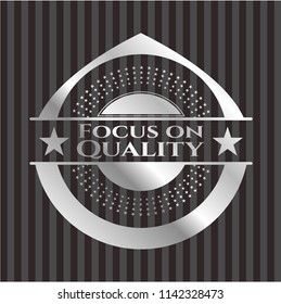 Focus on Quality silver badge or emblem