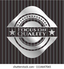 Focus on Quality silver shiny emblem