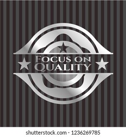 Focus on Quality silver shiny emblem