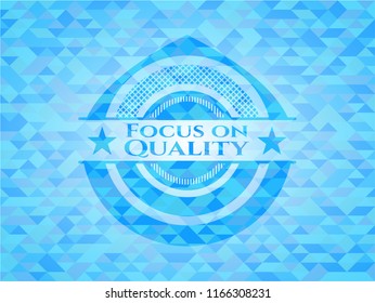 Focus on Quality sky blue emblem with mosaic background