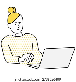 A focused professional types on a laptop while working remotely. 