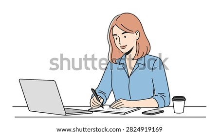 A focused young woman using a laptop computer at a desk in a professional workspace
