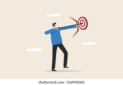 Focusing on the goal. Moving closer and more precisely to the target. Business goals, life, job duties, advertising and career development.  Businessman holding  bow aiming at a target at close range.