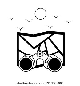folded map and binoculars image