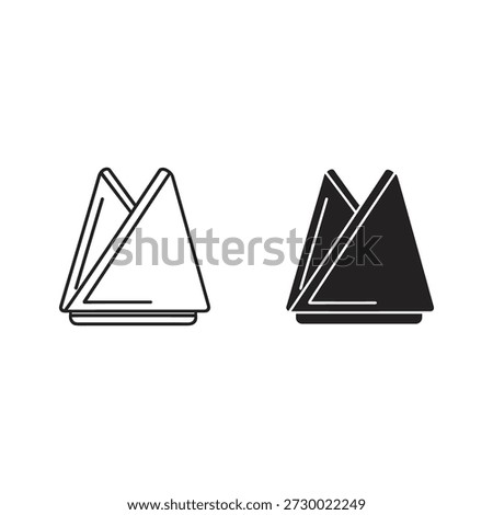 Folded napkin icon set in outline and solid style isolated on