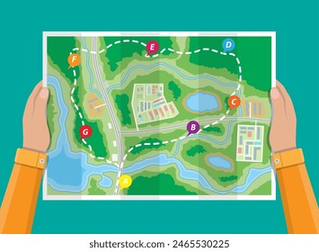 Folded paper city suburban map in hands. Abstract generic map with roads, buildings, parks, river, lake. GPS and navigation. Vector illustration in flat style