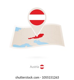 Folded paper map of Austria with flag pin of Austria. Vector Illustration