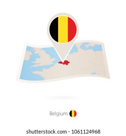 Folded paper map of Belgium with flag pin of Belgium. Vector Illustration
