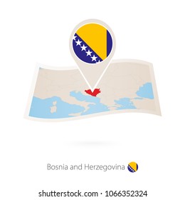 Folded paper map of Bosnia and Herzegovina with flag pin of Bosnia and Herzegovina. Vector Illustration