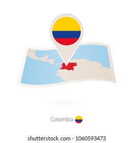 Folded paper map of Colombia with flag pin of Colombia. Vector Illustration