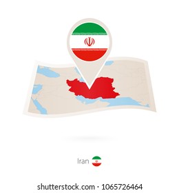 Folded paper map of Iran with flag pin of Iran. Vector Illustration