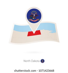 Folded paper map of North Dakota U.S. State with flag pin of North Dakota. Vector Illustration
