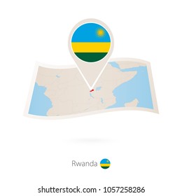Folded paper map of Rwanda with flag pin of Rwanda. Vector Illustration