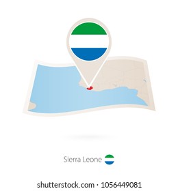 Folded paper map of Sierra Leone with flag pin of Sierra Leone. Vector Illustration