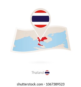 Folded paper map of Thailand with flag pin of Thailand. Vector Illustration